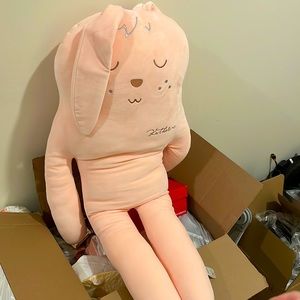 A pink rabbit/bunny plush